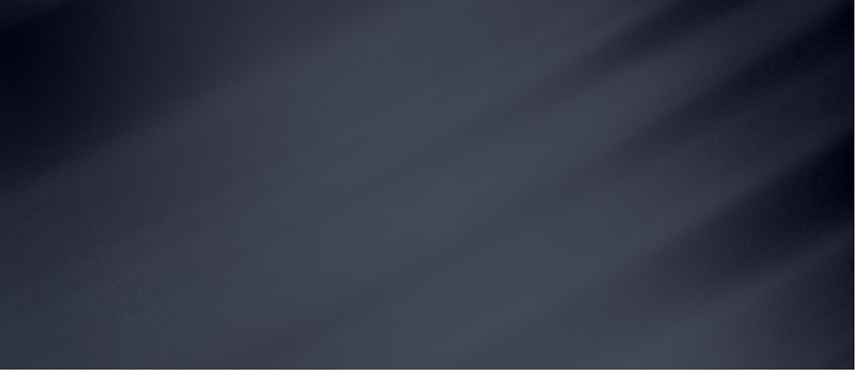 Brushed metal surface with subtle gradients.