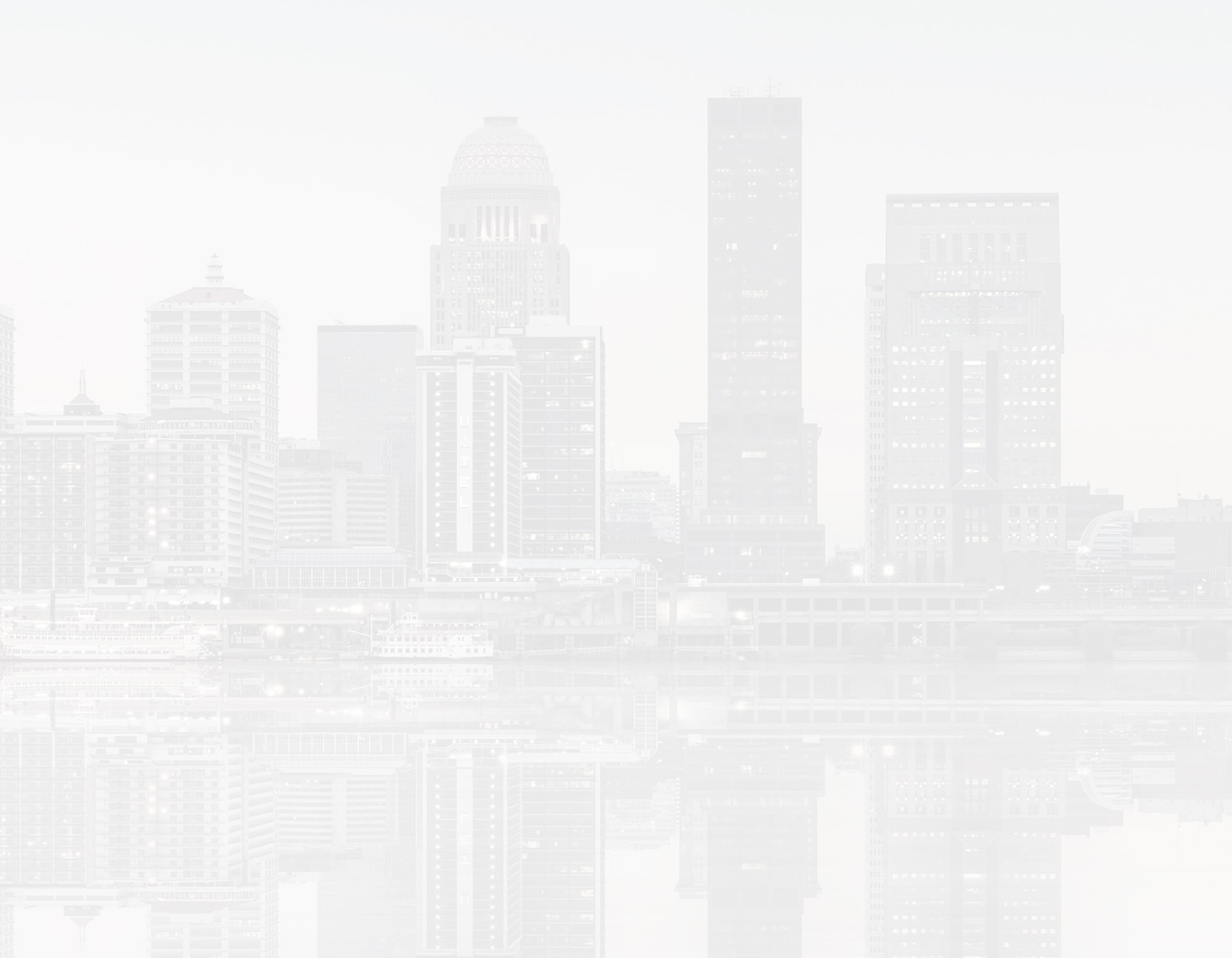 City skyline reflection on a foggy day.