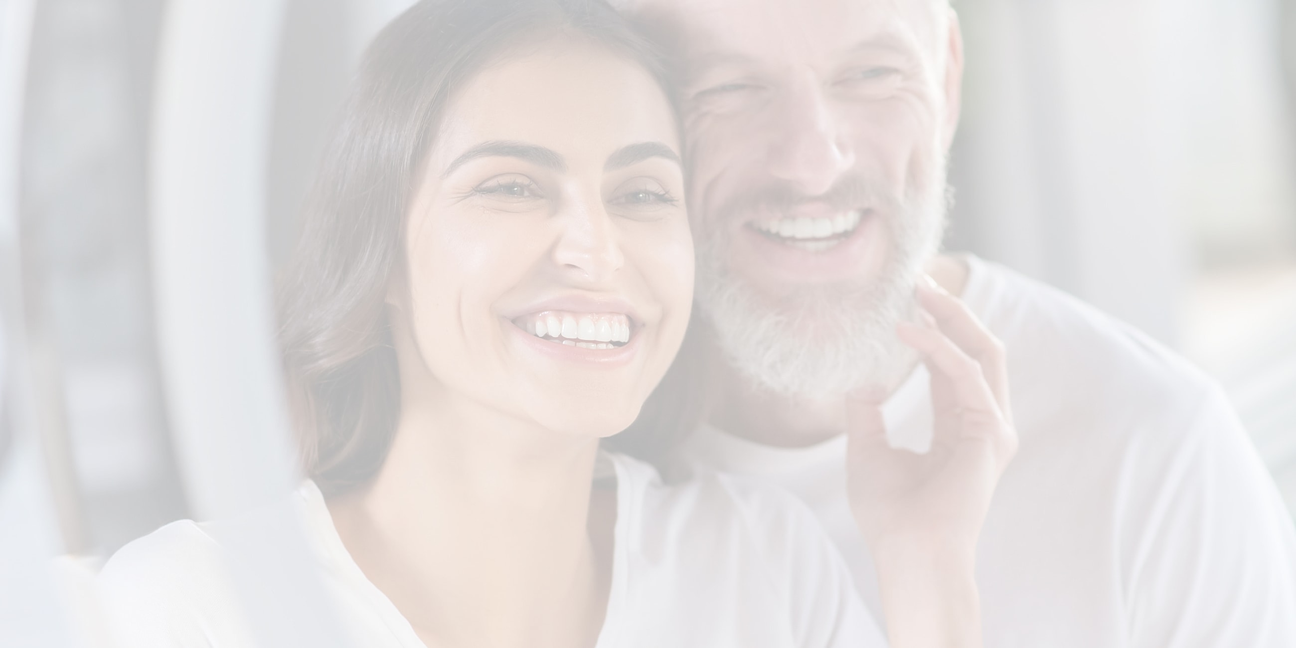 Smiling couple enjoying a joyful moment together.